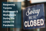 Photo of a glass window with a sign saying, "Sorry, we're closed"